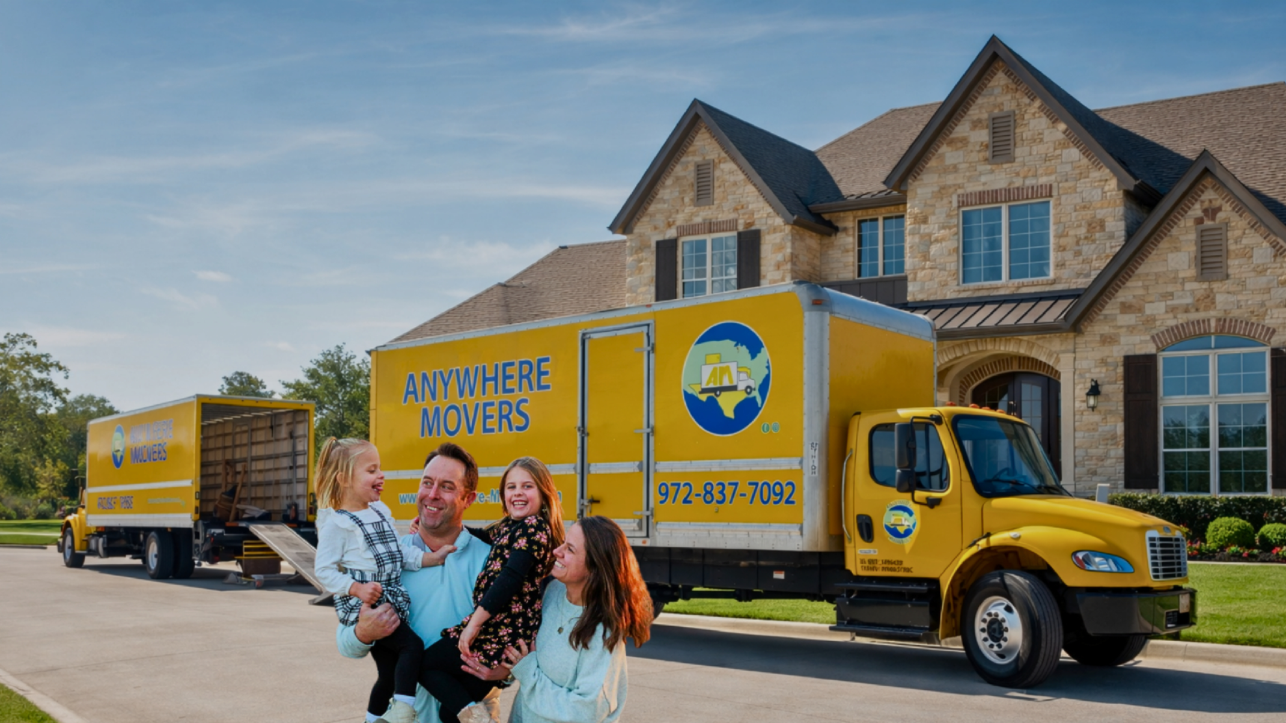 Anywhere Movers trucks and family in front of a North Texas home